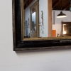 French, Ebonised and Gilt Mirror