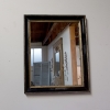 French, Ebonised and Gilt Mirror