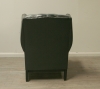 Pair Of Dark Green Leather Wing Chairs 