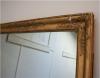 Large Empire gilt mirror