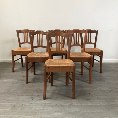 A Set Of Six French Rustic Dining Chairs